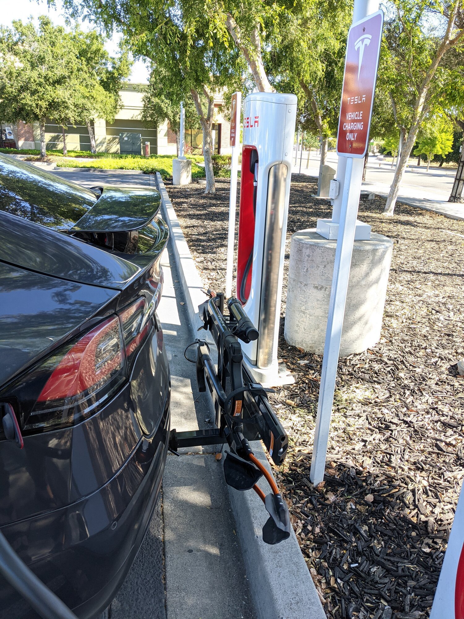 Tesla Model X Vehicle with a hitch mounted bike rack installed