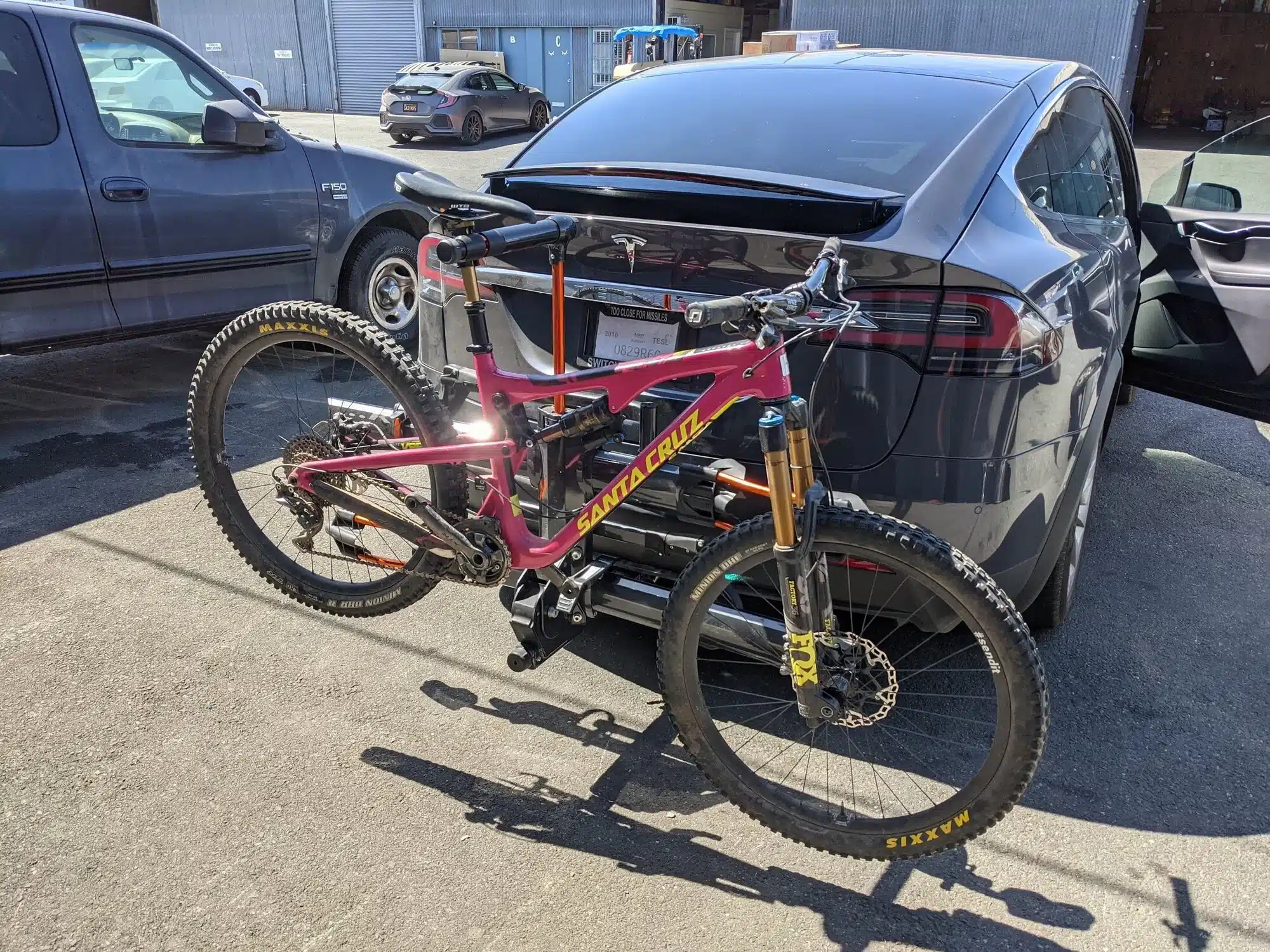 Tesla Model X Vehicle with a hitch mounted bike rack installed